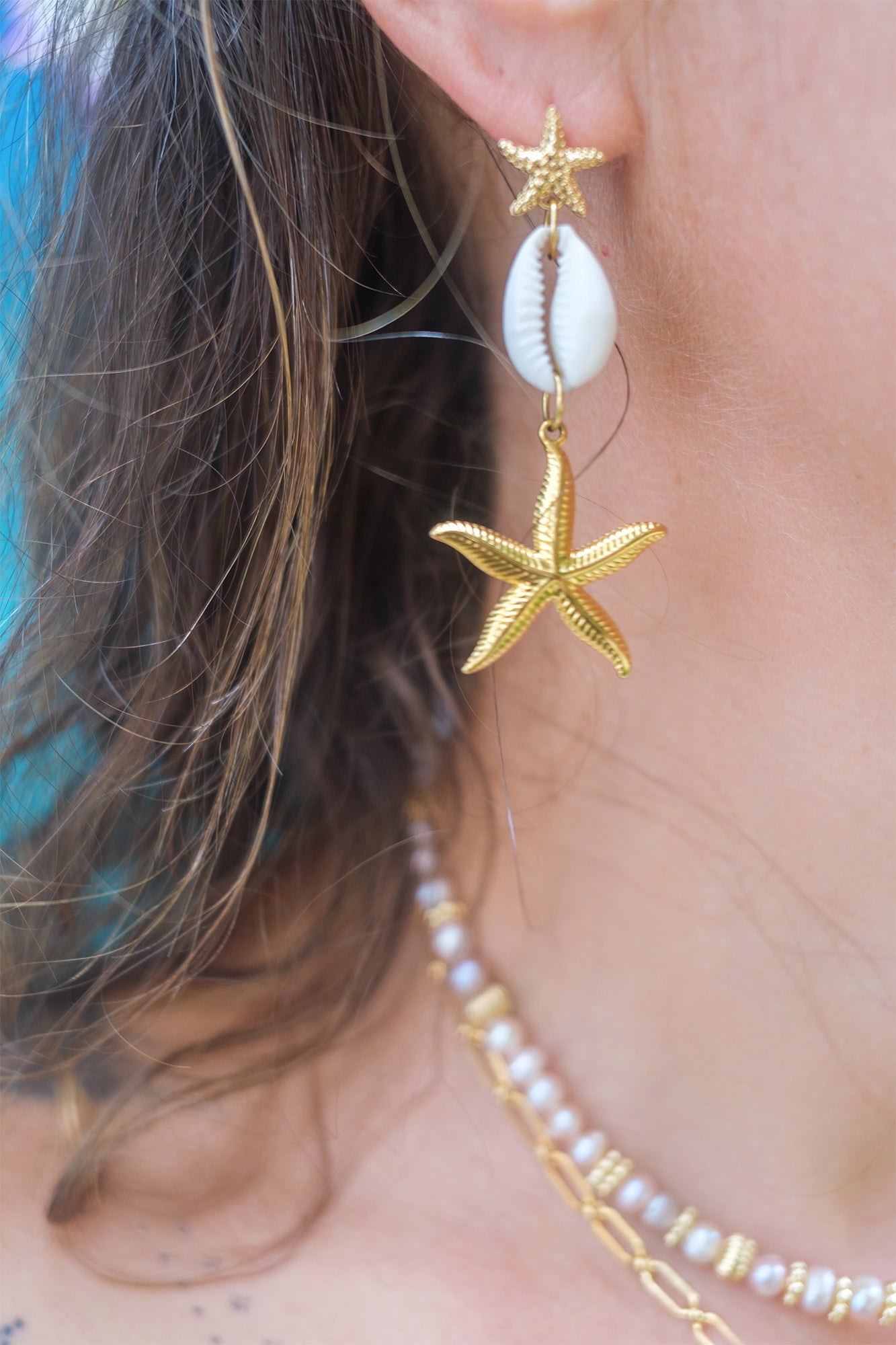 Boucles d’oreilles pendantes bohèmes – cauris & étoile de mer