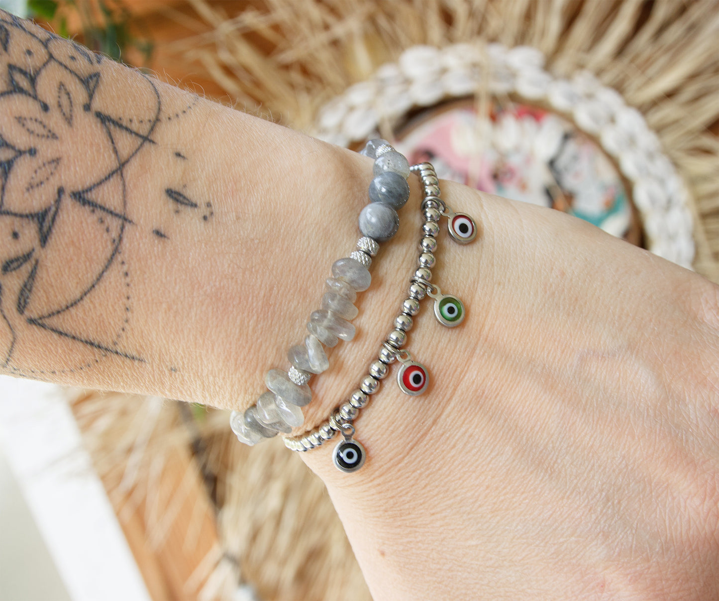 bracelet en acier inoxydable et pendentifs oeil