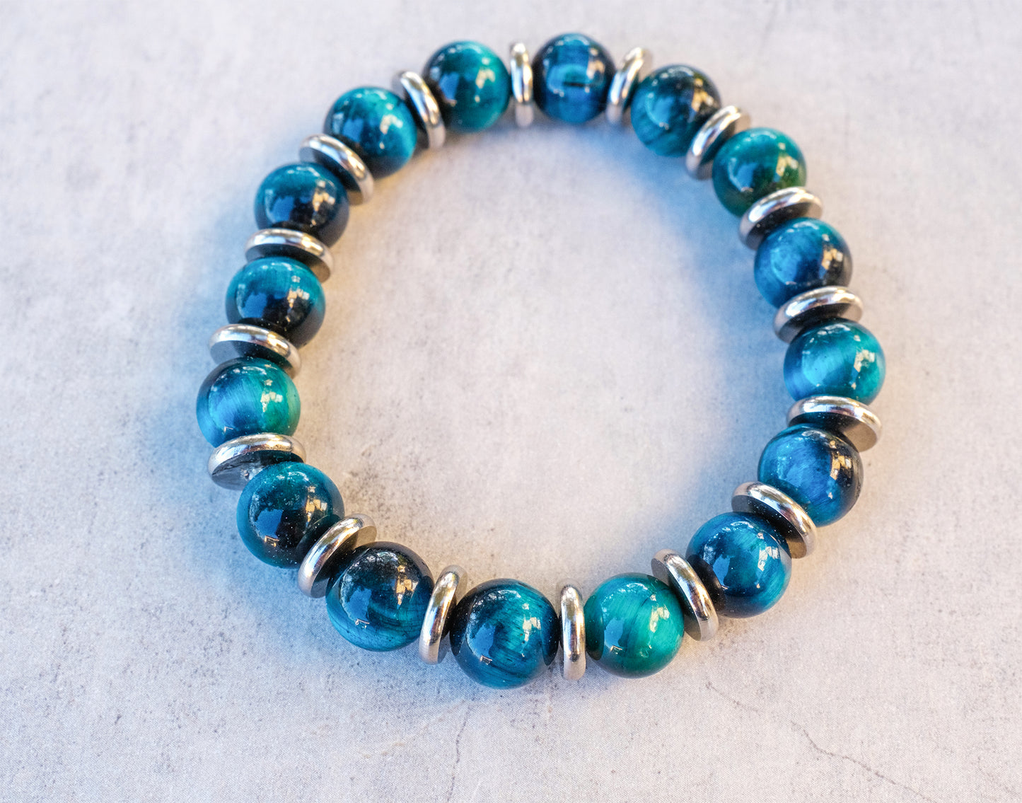 Bracelet homme perles oeil de tigre bleu 10mm - caurisandco