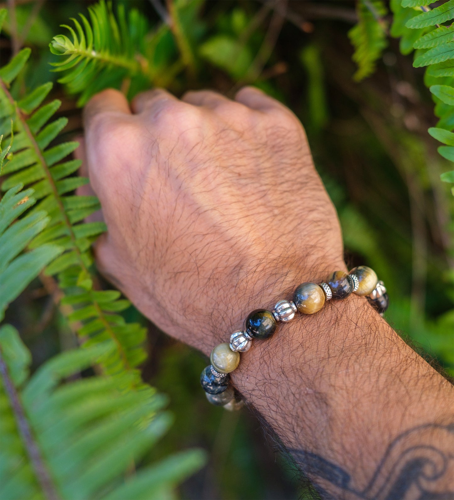 bracelet homme oeil de tigre jaune et obsidienne et perles en acier inox 10 mm