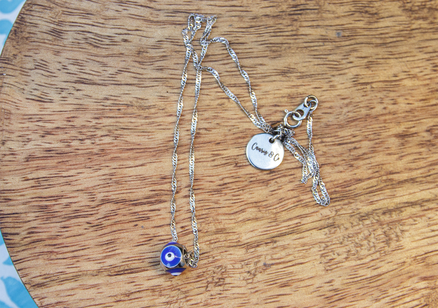 Collier femme en argent 925 et perle oeil bleu marine - caurisandco