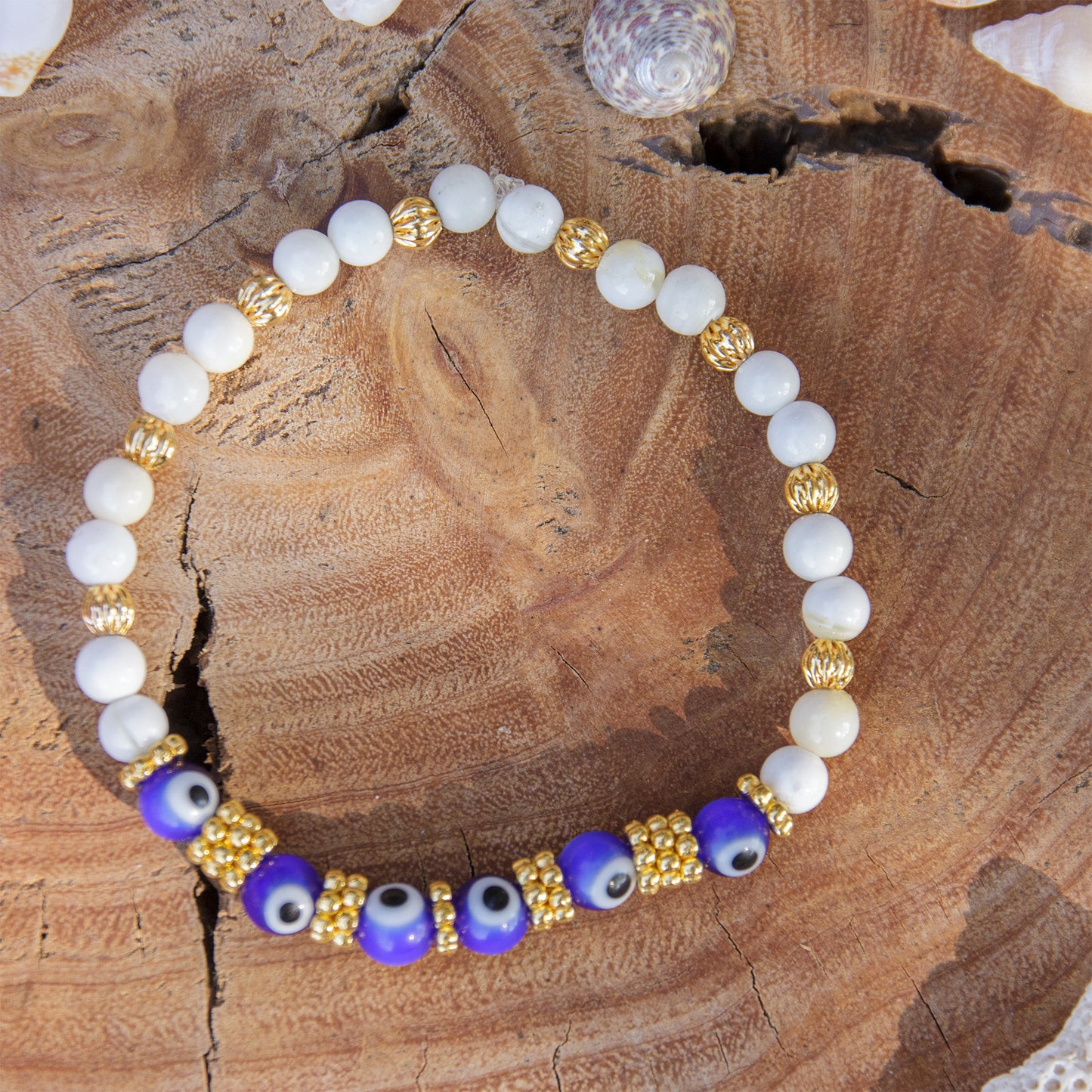 Bracelet femme nacre 4mm et perle en verre oeil - caurisandco