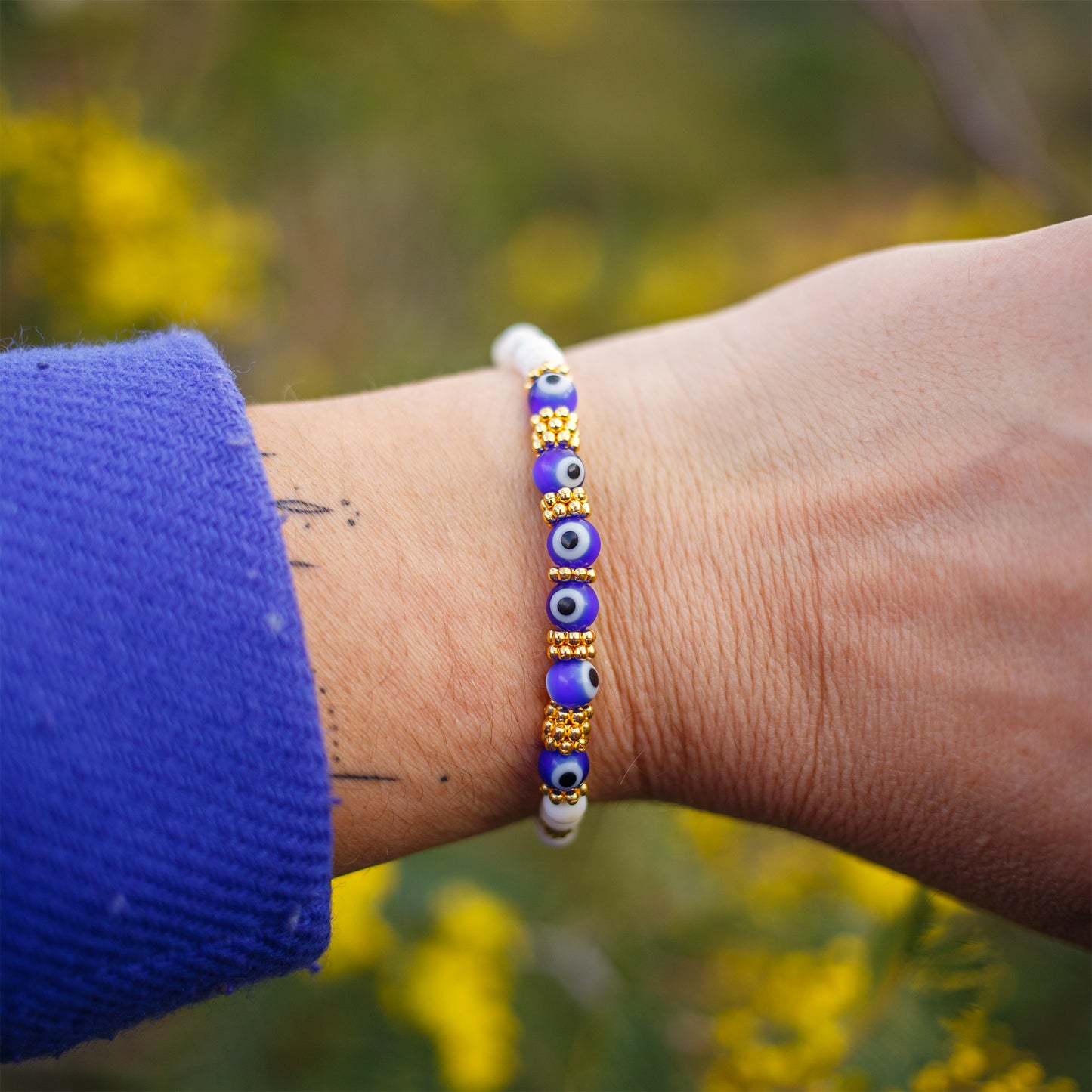 Bracelet femme nacre 4mm et perle en verre oeil - caurisandco