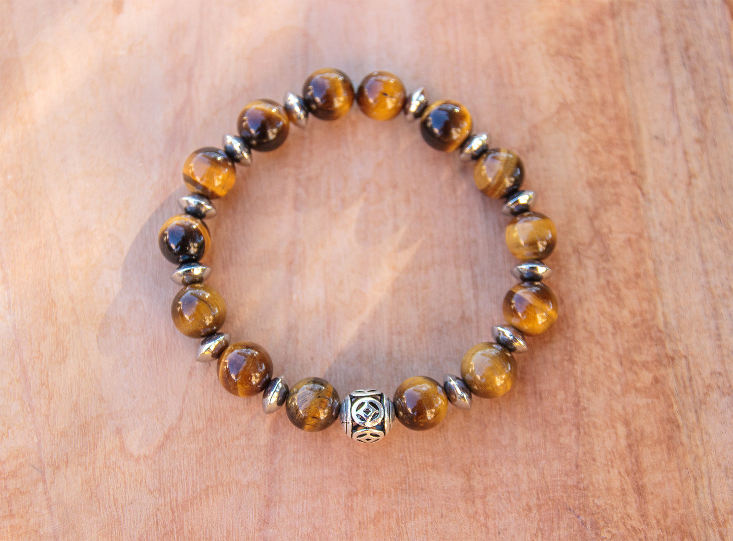 bracelet perles oeil de tigre et acier inoxydable 10mm - caurisandco