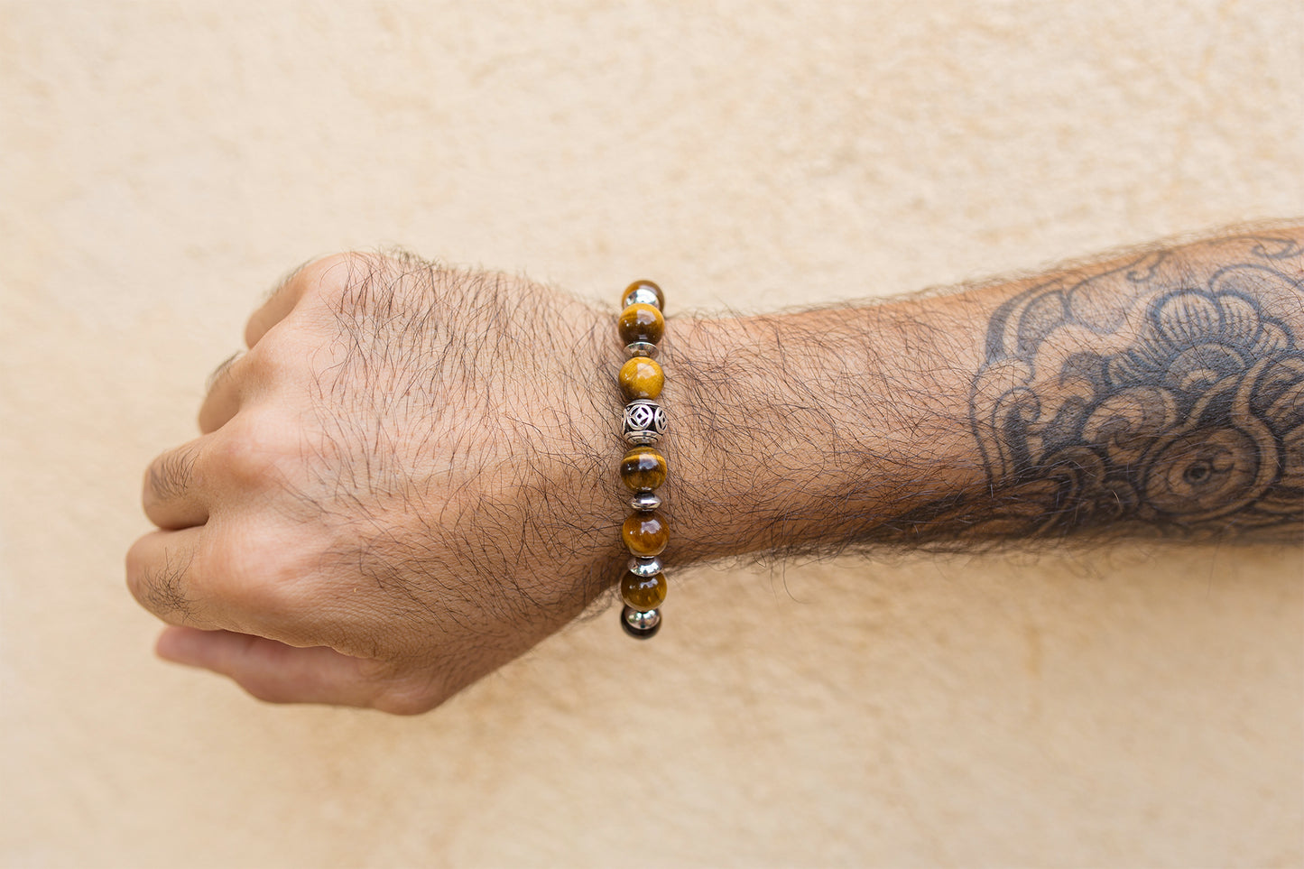 bracelet perles oeil de tigre et acier inoxydable 10mm - caurisandco