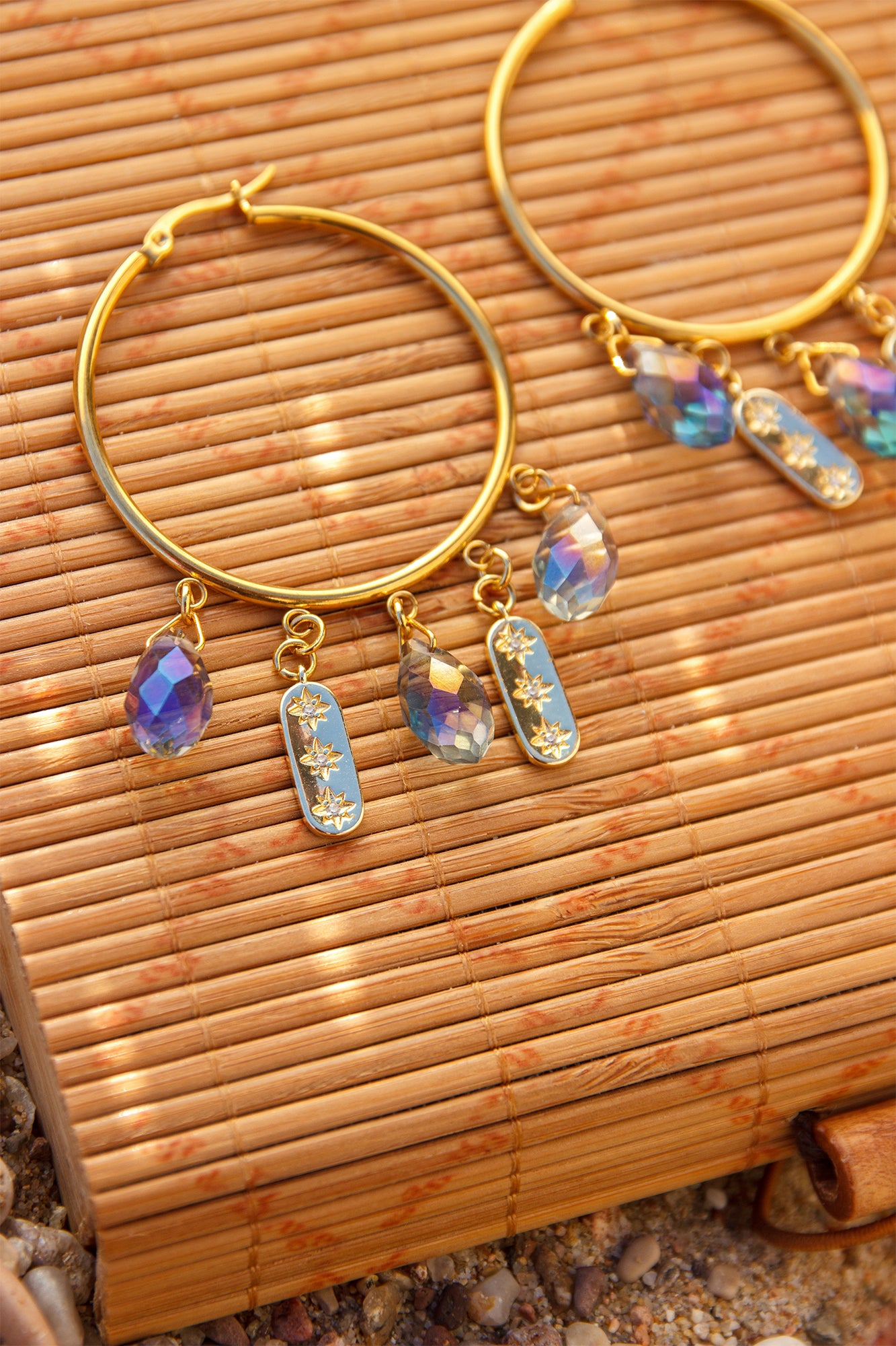 Créole à breloque goutte et pendentif étoilé