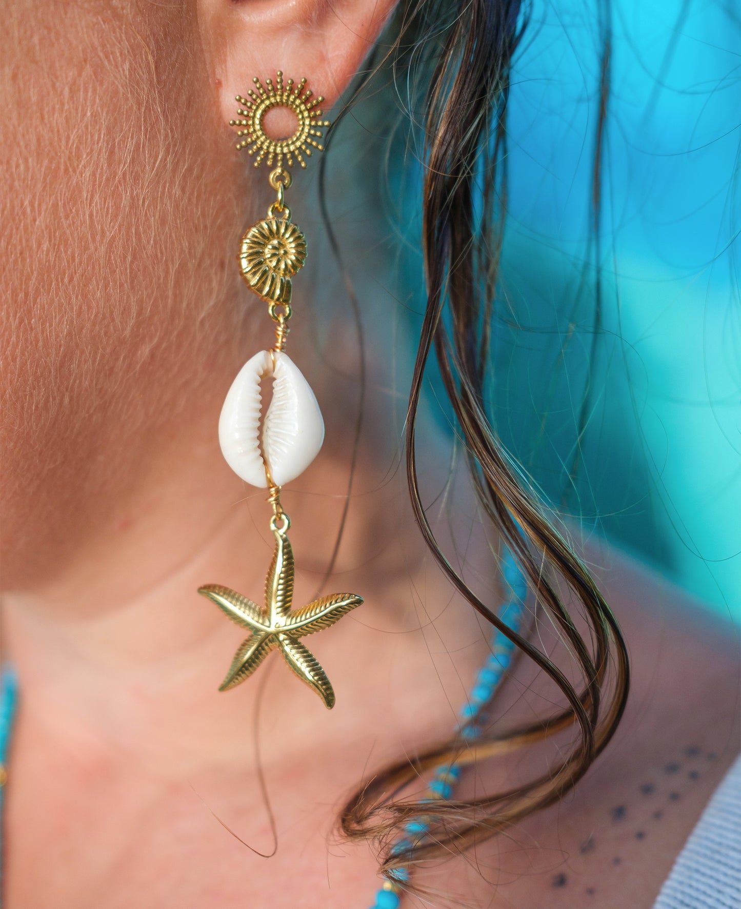 Boucles d’oreilles pendantes bohèmes cauris & étoile de mer