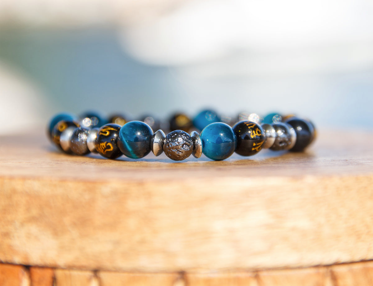 Bracelet homme perles oeil de tigre bleu 8mm perles noire en verre mantra et perle de lave