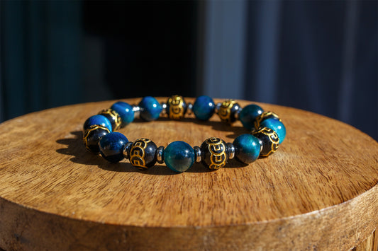 Bracelet homme perles oeil de tigre bleu et perles noires en verre gravée mantra 10mm