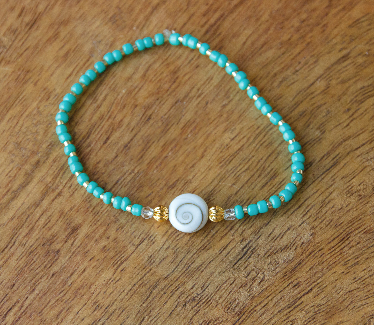 Bracelet perle femme oeil de sainte lucie turquoise