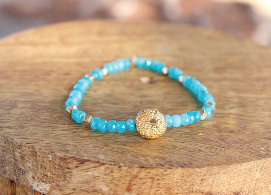 bracelet perle femme oursin doré et perle en verre turquoise