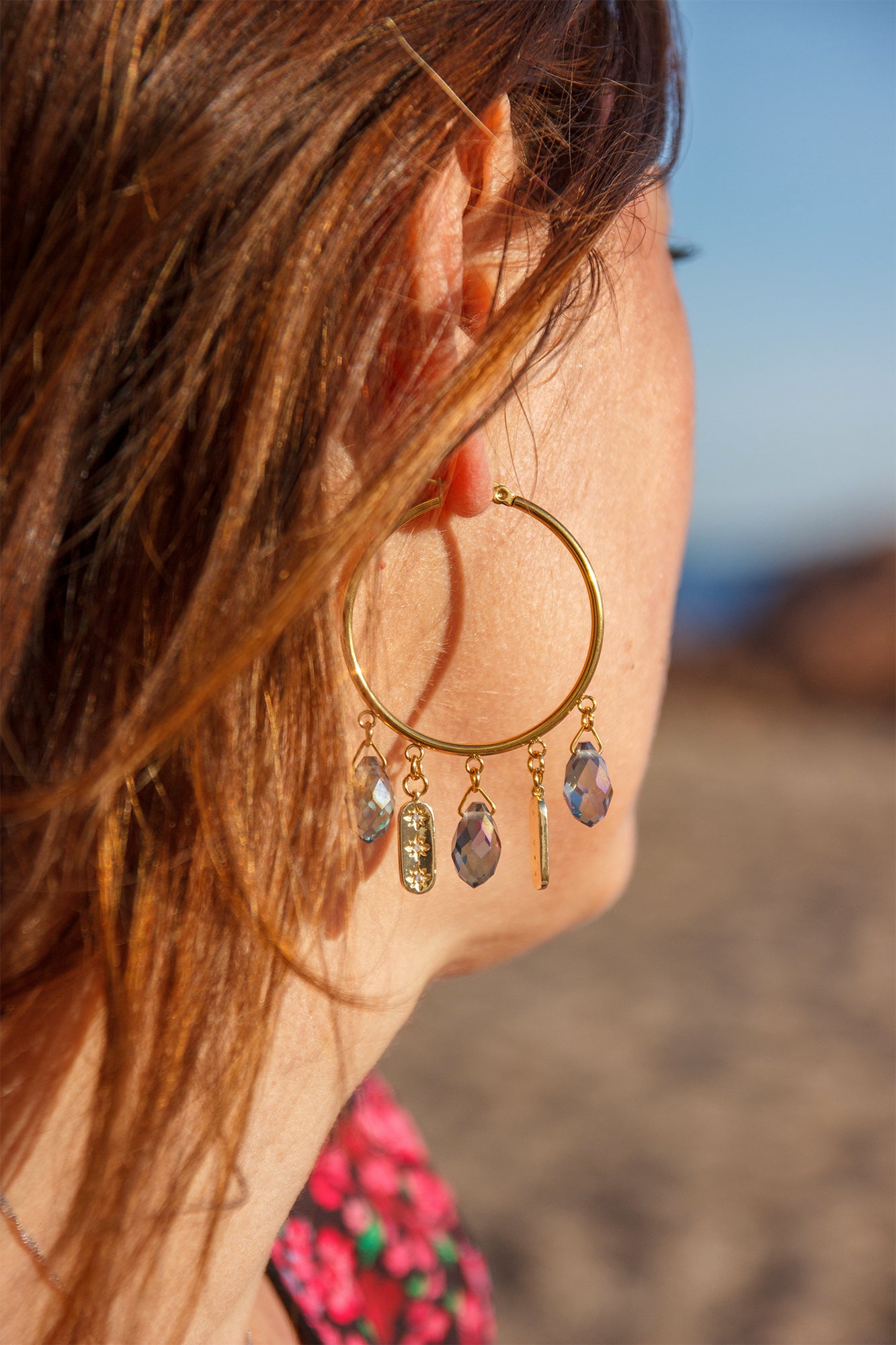 Créole à breloque goutte et pendentif étoilé